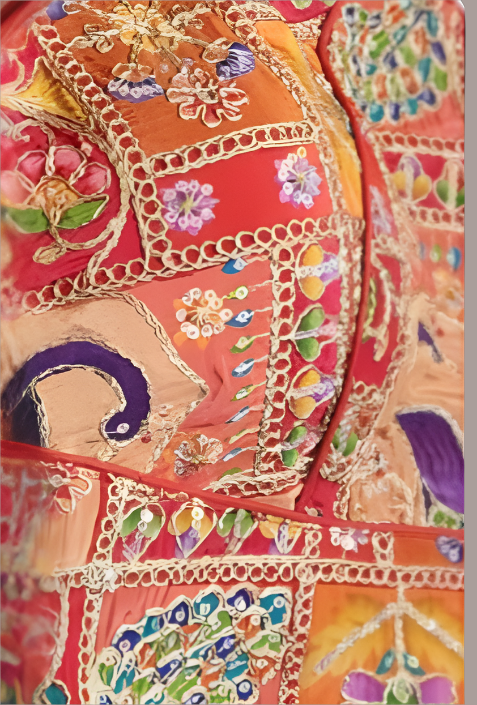 Red Kalamkari inspired and embroidered fabric with intricate patterns and vibrant colors, and peacock