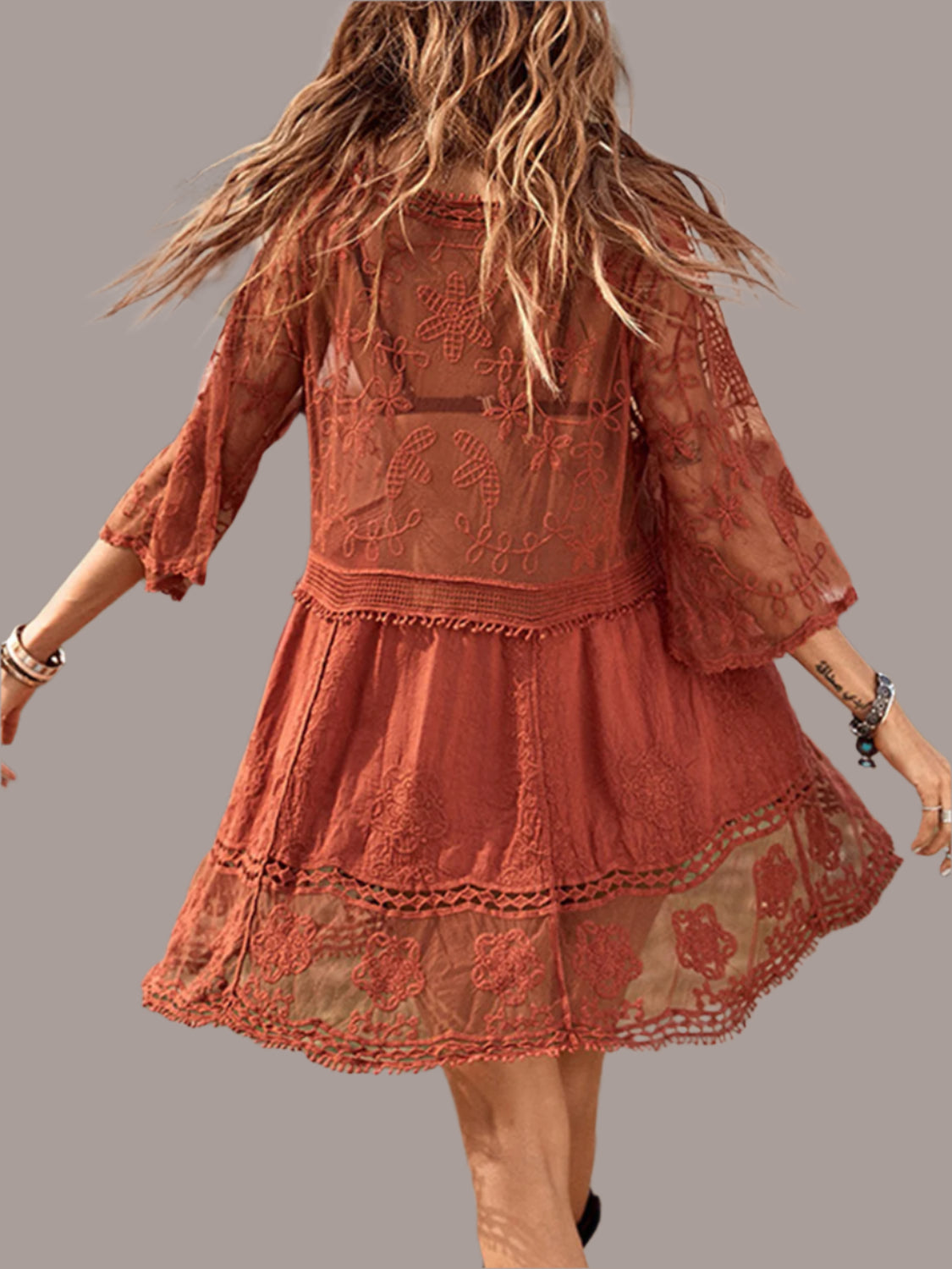 Lace plunge cover-up dress styled for beach wear - Back View
