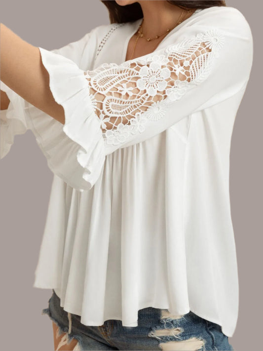 Women's white V-neck lace flounce sleeve top front view