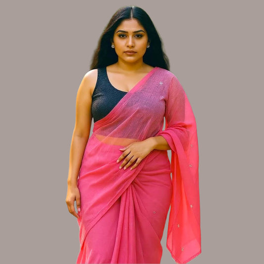 Woman in a pink saree, wearing sequence black blouse, crop top