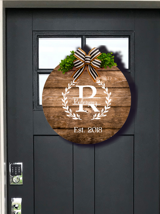 Custom wooden circle door hanger with monogram and established date by Paisley Decor It - handcrafted farmhouse decor