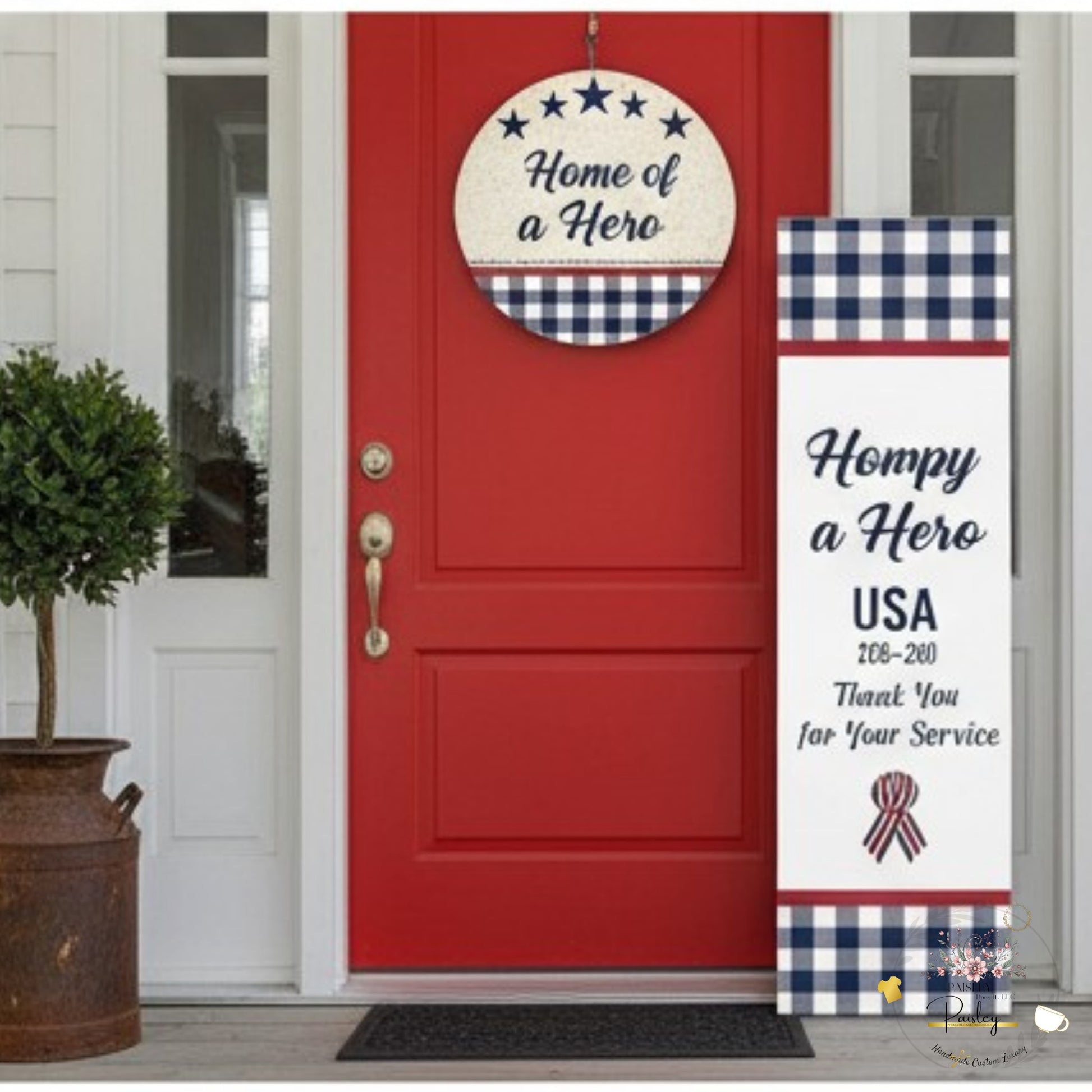 Red door with decorative sign and banner on a porch